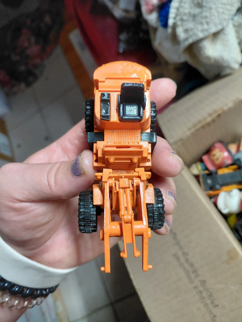 unbranded orange construction  bulldozer toy car missing scoop